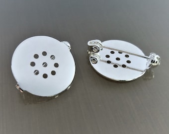 2 round spindle holders 17 mm silver color