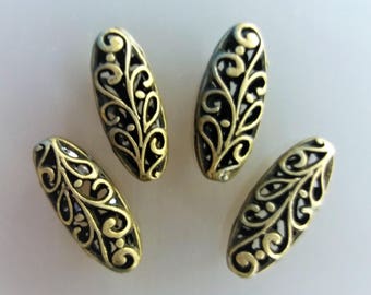 4 large oval beads metal openwork bronze color