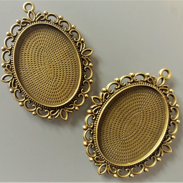 2 pendentifs pour cabochons ovales 40 mm X 30 mm métal coloris bronze