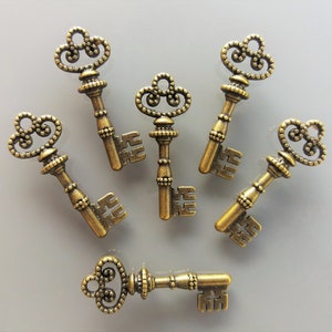 6 pendentifs clés 30 mm métal coloris bronze