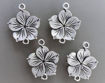 4 pendentifs connecteurs fleur 2 cm coloris argent