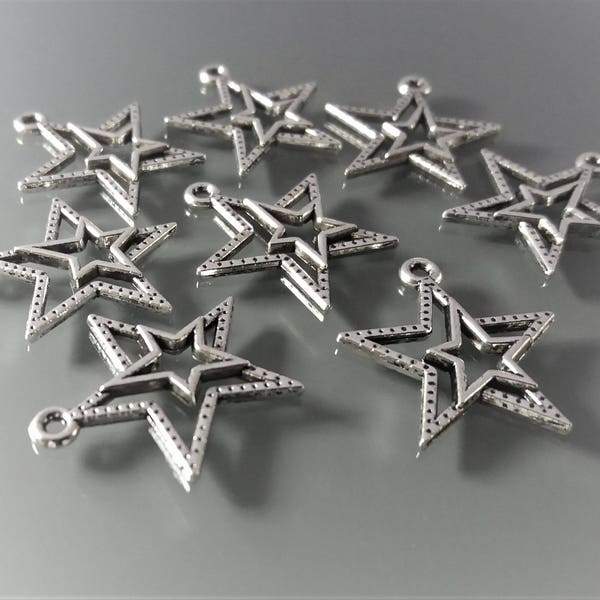 8 pendentifs 2,2 cm étoiles métal coloris argent