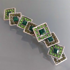 7.2 cm silver-colored fancy brooch with green stones