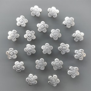 20 silver colored metal flower beads