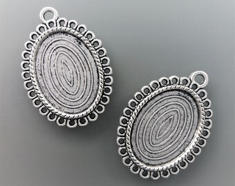 2 pendentifs pour cabochons ovales 25 mm X 18 mm métal coloris argent