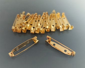 20 pins, 3 cm, gold-colored brooch backs