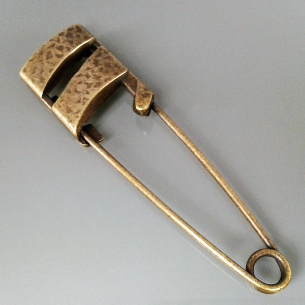 Spilla 7,6 cm in metallo color bronzo con testa fantasia