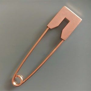 Brooch 8 cm rectangular head copper color metal