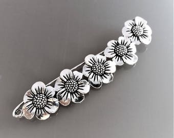 Broche 8.8 cm fleurs métal coloris argent