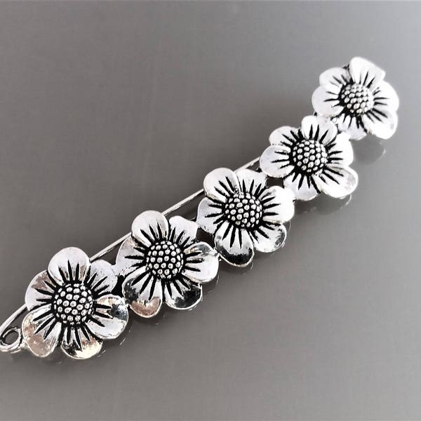 Broche 8.8 cm fleurs métal coloris argent