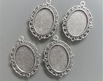 4 pendentifs pour cabochons ovales 25 mm X 18 mm métal coloris argent