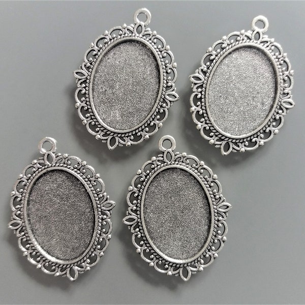 4 pendentifs pour cabochons ovales 25 mm X 18 mm métal coloris argent