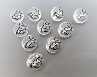 10 boutons transparents 12 mm gravés fleur noire avec coeur en strass