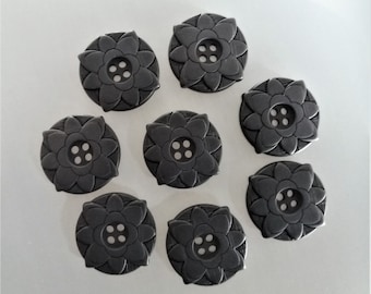 8 boutons fleurs 25 mm plastique noir mat