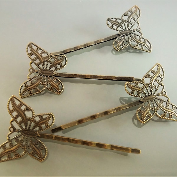 4 barrettes papillons filigrane coloris bronze