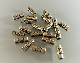 20 perles tubes 8 mm gravées métal coloris bronze