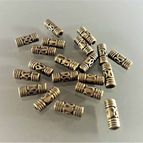 20 perles tubes 8 mm gravées métal coloris bronze