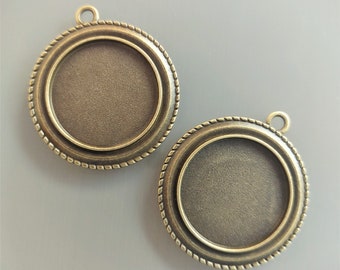 2 pendentifs pour cabochons ronds 25 mm métal coloris bronze