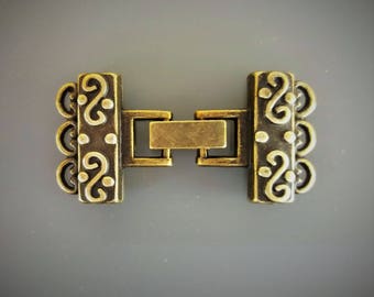 Fermoir à clips 3 rangs métal coloris bronze