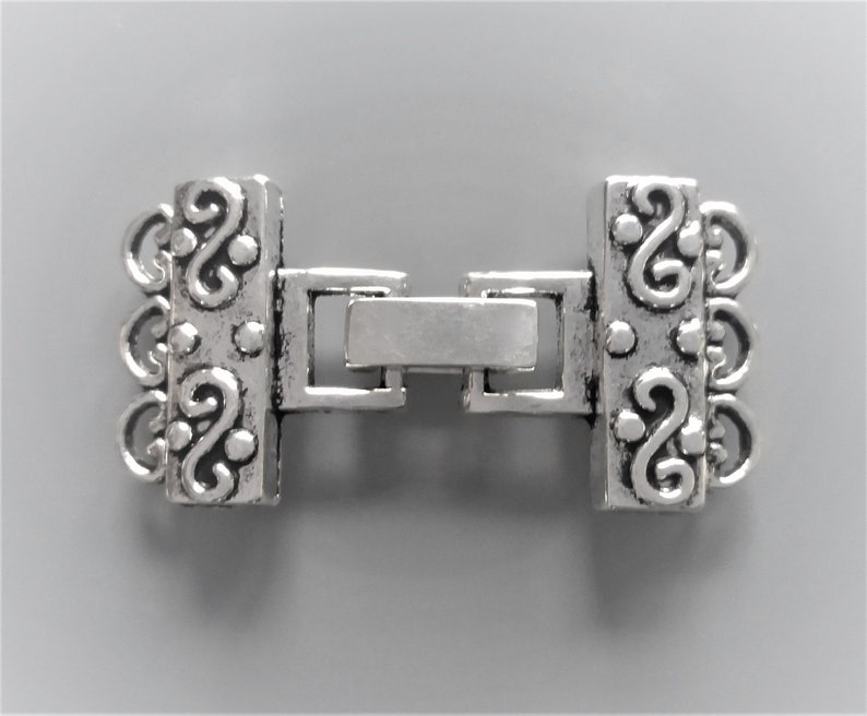 Clasp with 3 rows clips metal silver color image 1