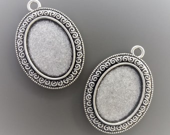 2 pendentifs pour cabochons ovales 25 mm X 18 mm métal coloris argent