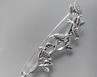 Broche 9 cm branche avec oiseaux métal coloris argent