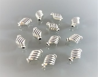 12 perles losanges métal gravé coloris argent