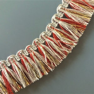 Galon franges rouge, beige et or largeur 32 mm