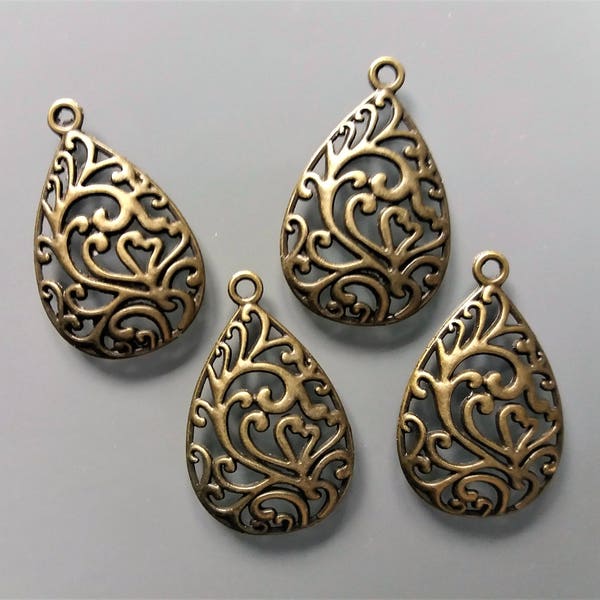 4 pendentifs gouttes ajourées métal coloris bronze