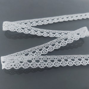 Dentelle fine blanche de coton largeur 12 mm