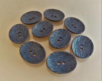 9 large oval buttons 38 mm in ribbed navy blue plastic