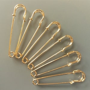 6 safety pins 55 mm golden color