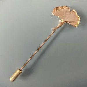 Gingko leaf brooch in gold-colored metal