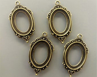 4 pendentifs pour cabochons ovales 25 mm X 18 mm métal coloris bronze