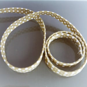 Passepoil beige à pois blancs 10 mm