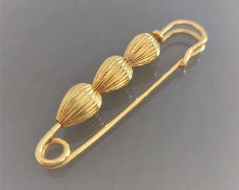 Fancy gold pin brooch