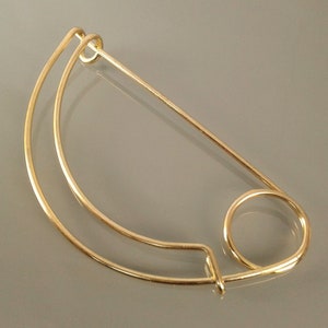 Perno ad arco in metallo color oro