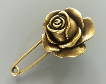 Broche 5.8 cm avec une rose métal coloris bronze