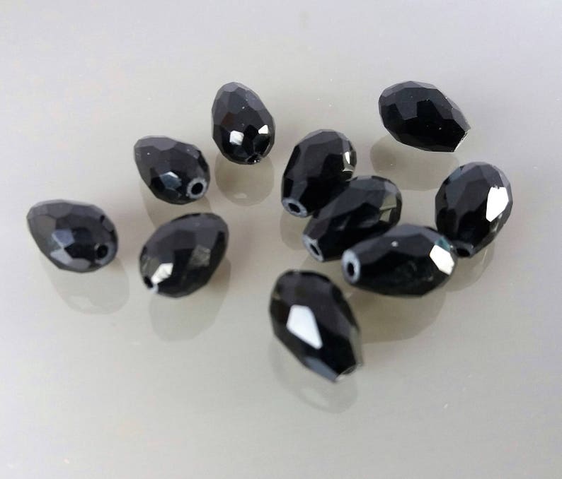 10 perles 11 mm en verre noire avec facettes image 1