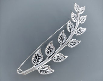 Broche 8,5 cm branche avec feuilles métal coloris argent