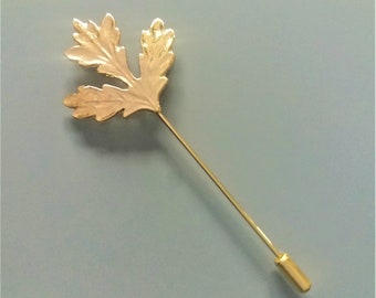 Fibula leaf metal golden color