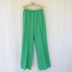 May include: A pair of green wide-leg pants with a waistband.