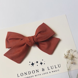 Rust 100% cotton bow handmade in USA on baby nylon headband lead free hair clip or pigtail clip set solid basic brown tan red