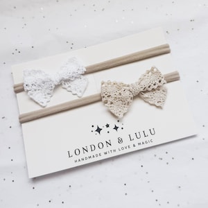 White or tan little lace baby bow on soft nylon headband or clip newborn baby toddler kids girls ivory cream boho crochet wedding ceremony