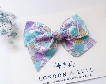 Liberty of London twirl bow Betsy mint lavender girls hair accessories kids toddler pigtails baby nylon headband floral flower tana lawn