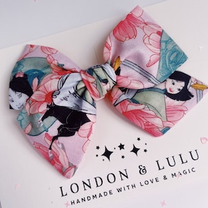 Mulan warrior princess bow in pink Chinese floral print twirl clip or headband pigtails set magic parks Asia
