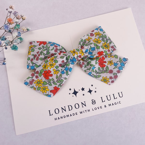 Liberty of London Emilia’s Bloom B bow girls hair clip baby nylon headband toddler pigtails accessories red white blue yellow flowers floral