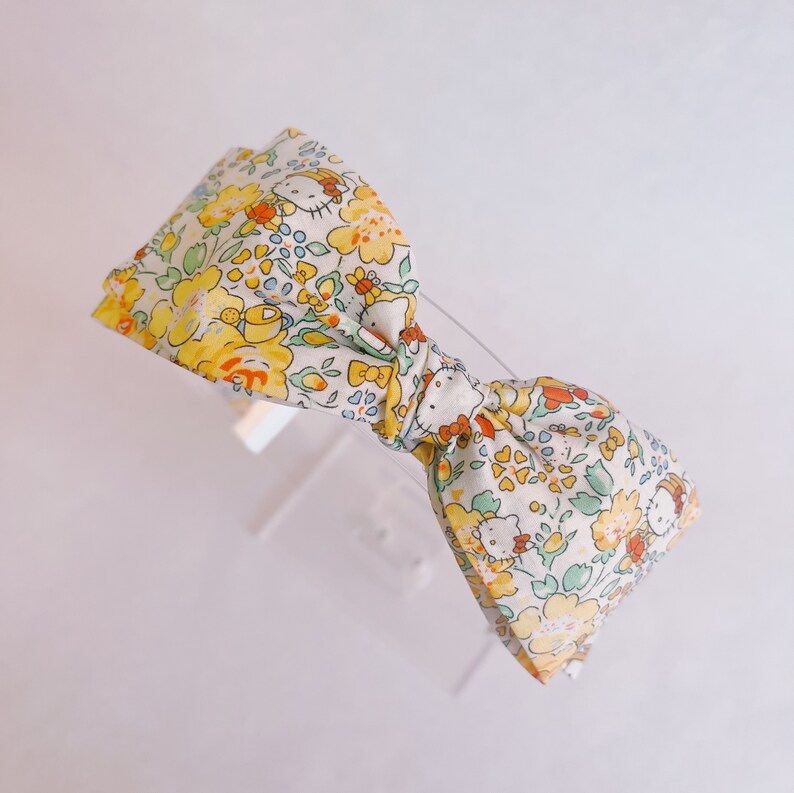 Liberty of London x kitty yellow floral twirl bow girls hair clip toddler pigtails baby nylon headband rainboots gardening garden umbrella image 4