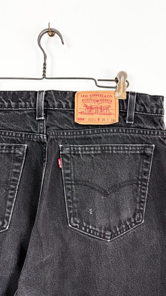 Vintage 1990s Levi’s 550 Red Tab Relaxed Tapered Black Denim Jeans USA 36x34