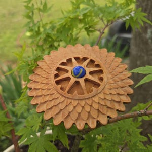 Sun flower with glass orb honey bee waterer